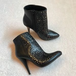 Cushion walk black and gold booties
